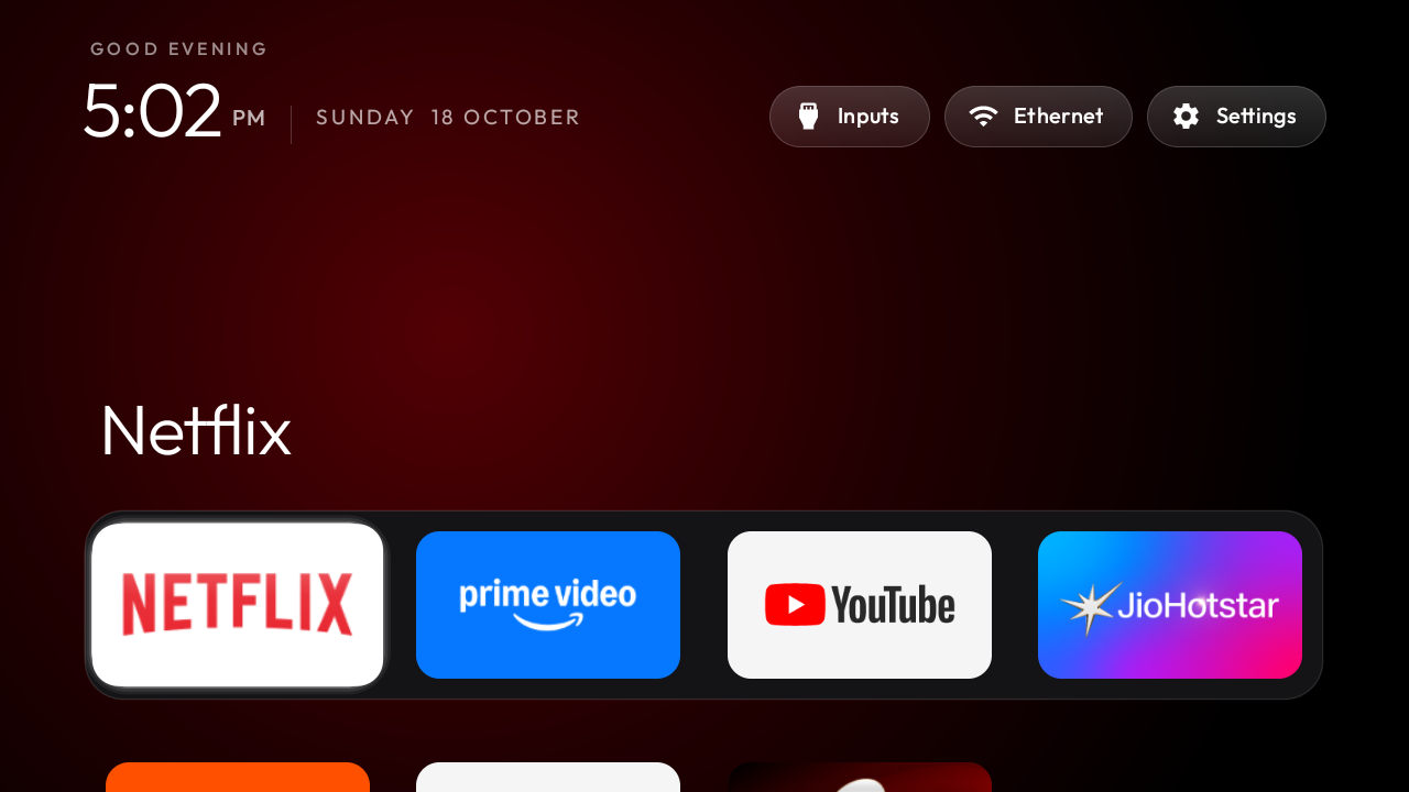 Upstream CleanYourTV launcher showing a minimal black home screen and app dock
